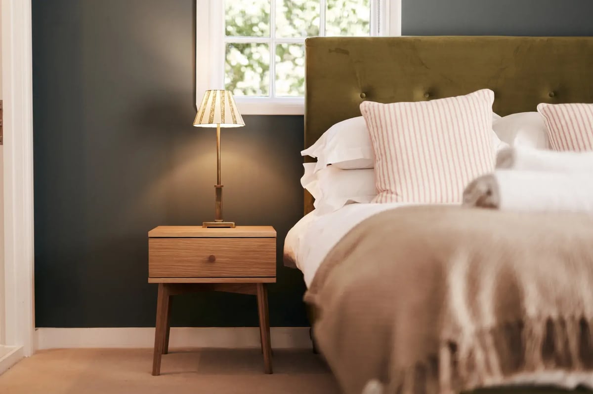 Bedroom with bedside table in accommodation at High House