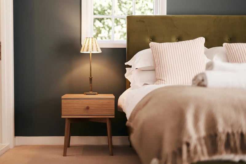 Bedroom with bedside table in accommodation at High House