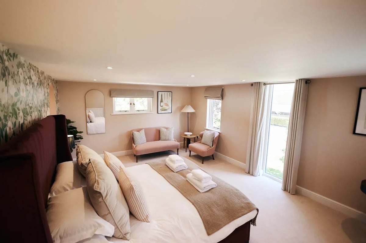 Bedroom with sofa area at High House