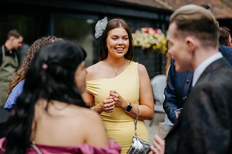 Guests talking after the wedding at High House