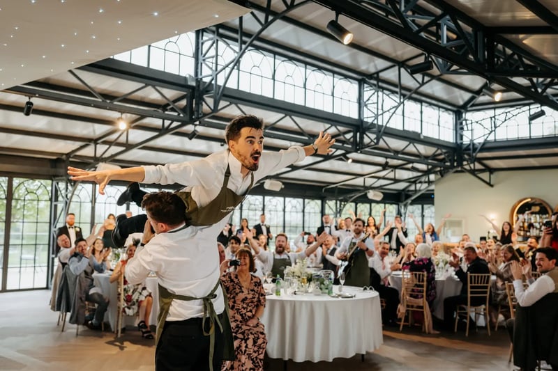 Guests enjoying entertainment in the Orangery at High House