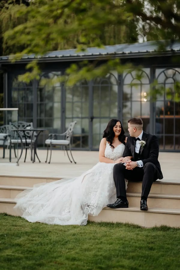 couple outside high house orangery